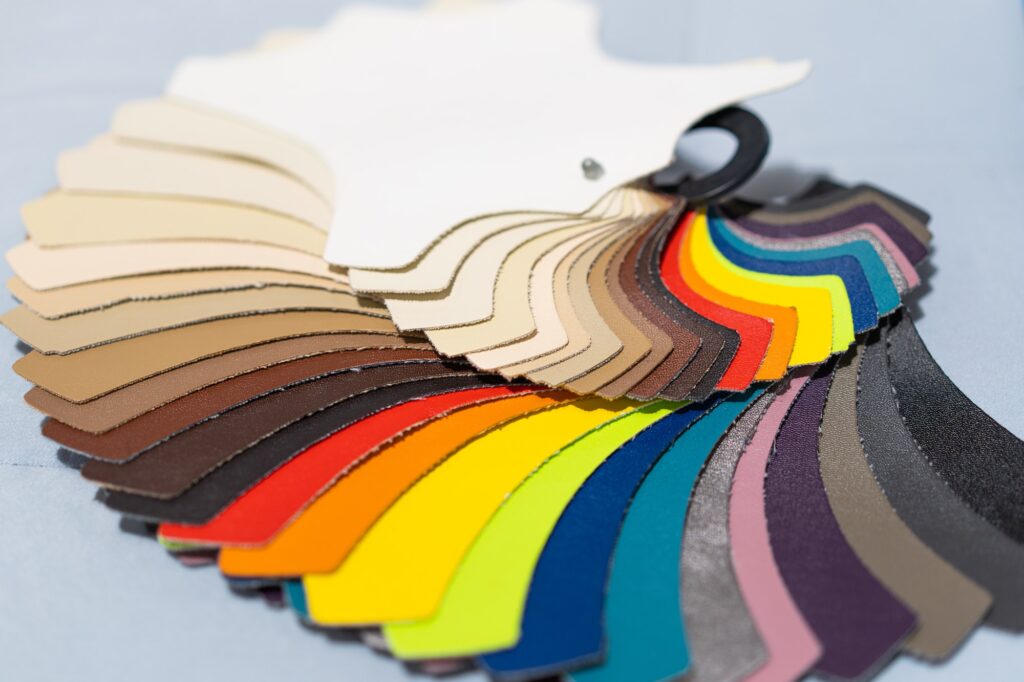 Catalog of multicolored imitation leather from matting fabric texture background